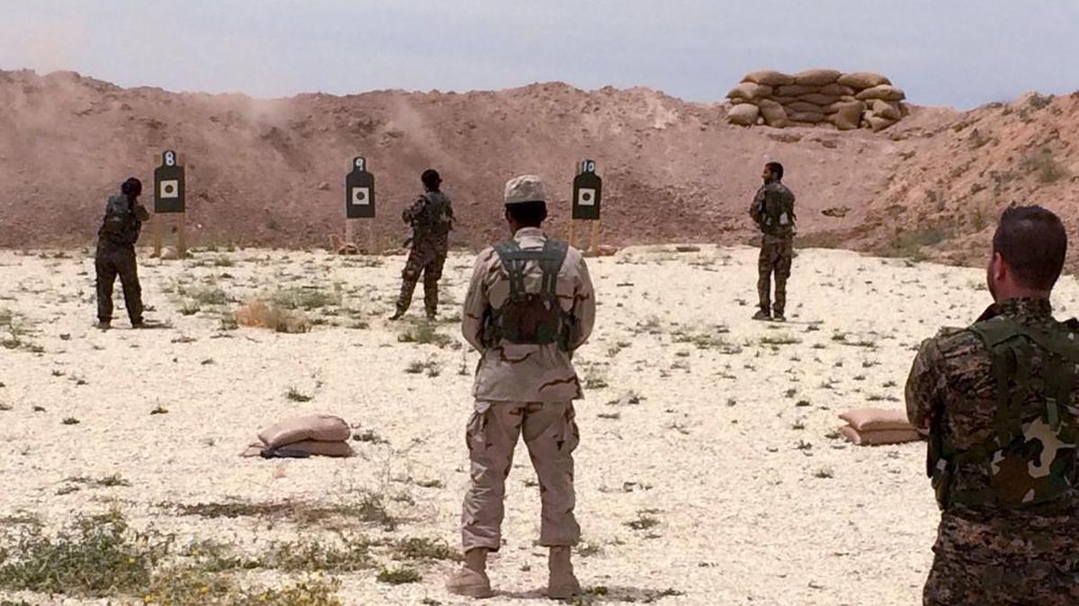 Fighters allied with the United States against the Islamic State practiced firing their small arms at an undisclosed training range in northern Syria in 2016.