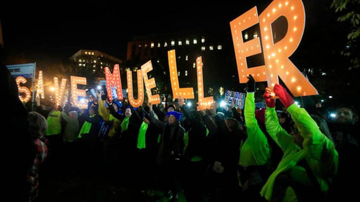 Protesters gathered in front of the White House in Washington, Thursday, as part of a nationwide “Protect Mueller” campaign demanding that Acting U.S. Atty. General Matthew Whitaker recuse himself from overseeing the ongoing special counsel investigation.