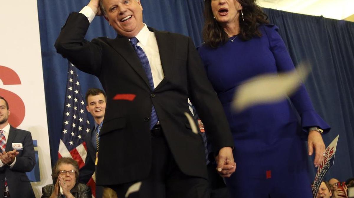 Democratic candidate for U.S. Senate Doug Jones and his wife Louise greet supporters during an election-night watch party Tuesday, Dec. 12, 2017, in Birmingham , Ala. Jones defeated Republican Roy Moore.