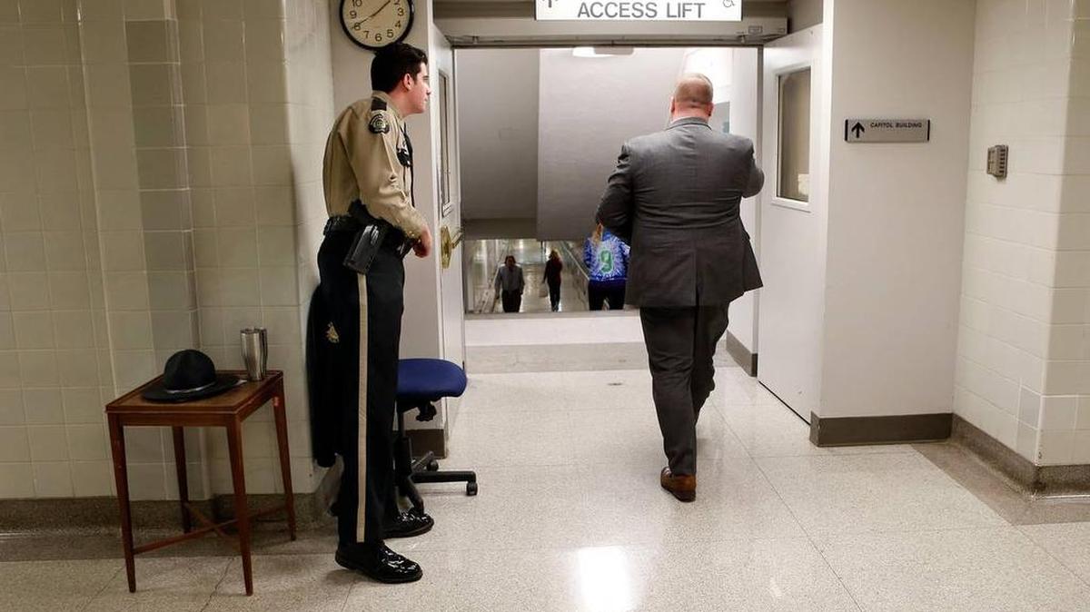 Officer Chris Smith, with Facilities Security for the Kentucky State Police, worked at a new security station at the tunnel leading from the Capitol annex to the Capitol in Frankfort, Ky. Several new security measures have been put into effect at the Capitol. Republican Gov. Matt Bevin on Jan. 4 signed an emergency regulation outlining procedures for the state Finance and Administration Cabinet to implement to “protect the health, safety and welfare of visiting members of the public, as well as staff” in the two buildings and other state facilities and grounds.