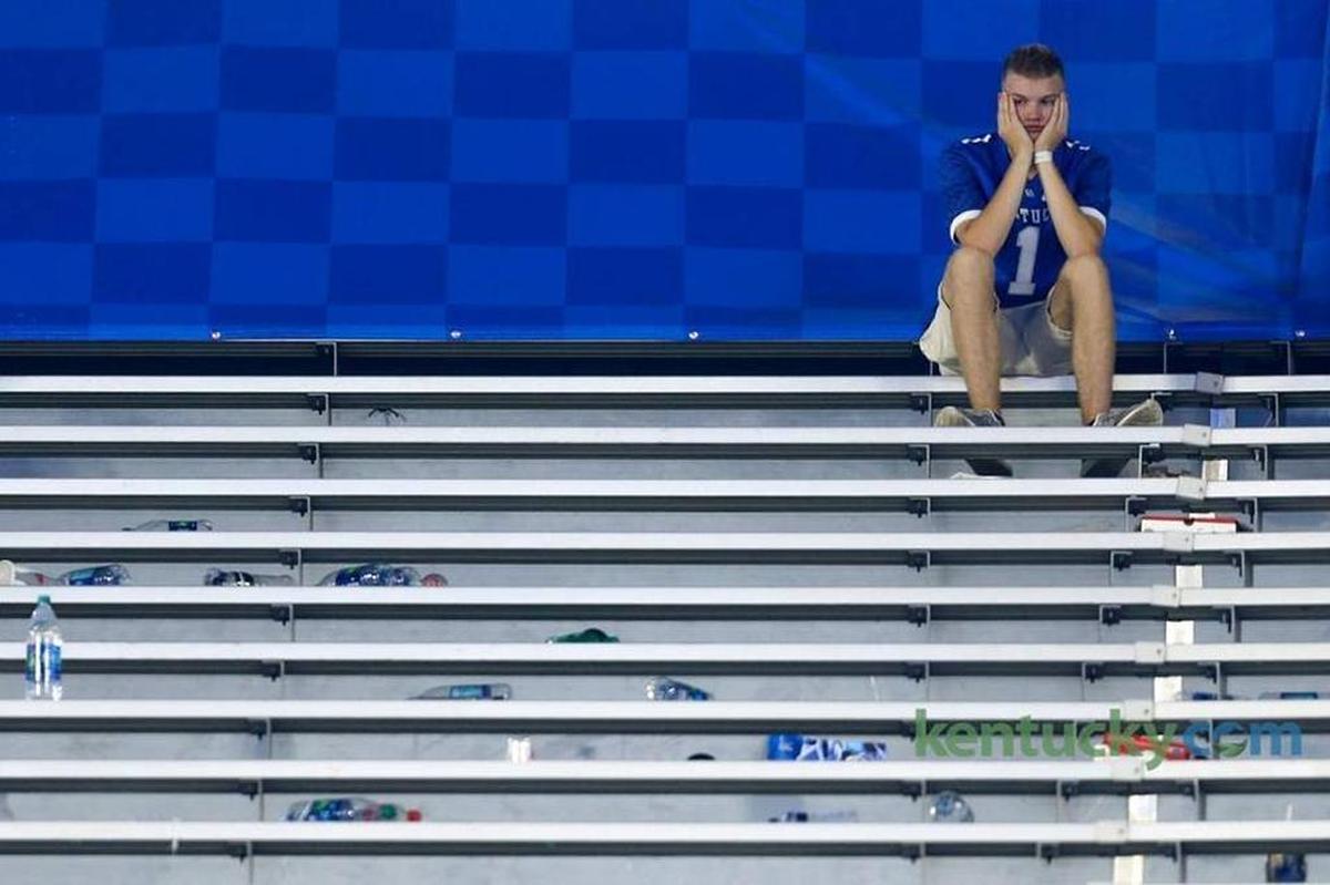 A dejected fan sat in the stands after Kentucky’s come-from-ahead 28-27 loss to Florida in 2017.