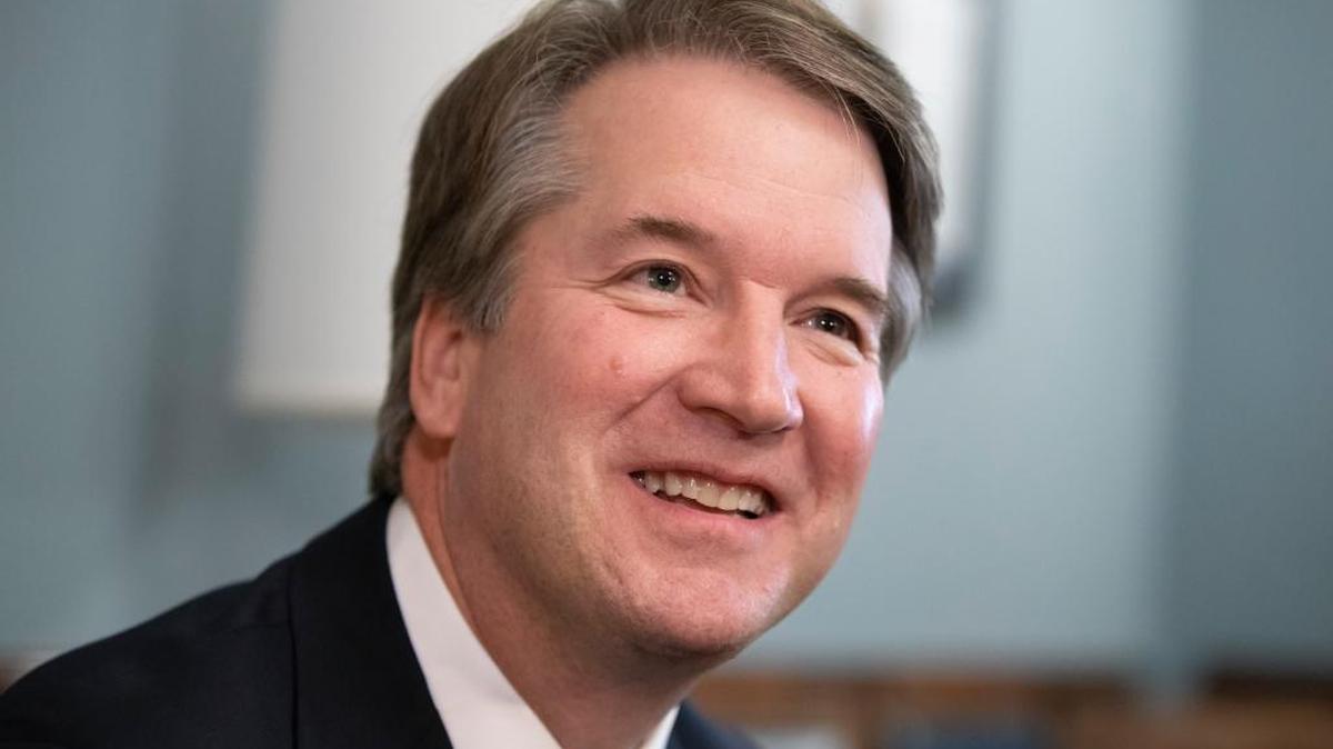 Supreme Court nominee Judge Brett Kavanaugh smiles during a meeting with Sen. Mike Lee, R-Utah, a member of the Judiciary Committee, on Capitol Hill in Washington, Wednesday, July 18, 2018. The Senate GOP leadership wants to have the confirmation process for Kavanaugh completed in time for him to join the high court at the start of its new term in October. (AP Photo/J. Scott Applewhite)