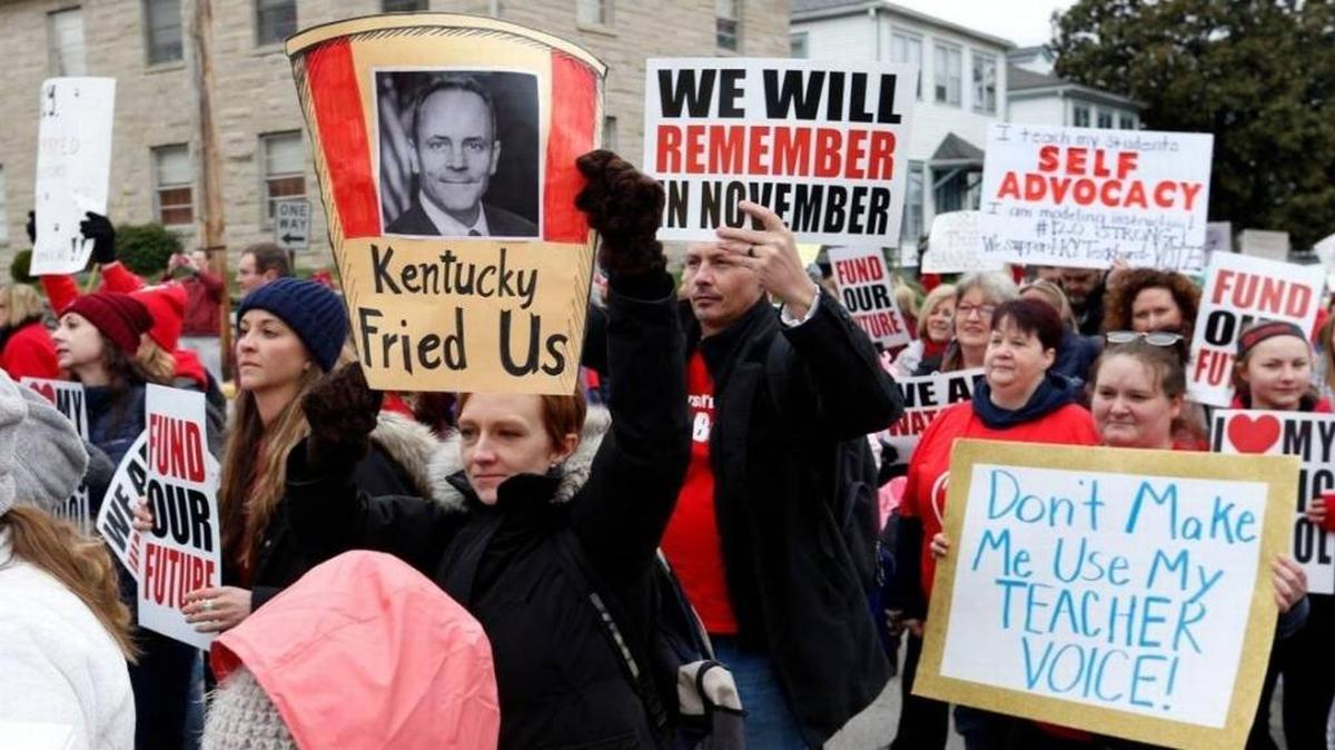 Thousands of Kentucky school teachers marched April 2 in Frankfort to protest education cuts and changes to their pension plan.