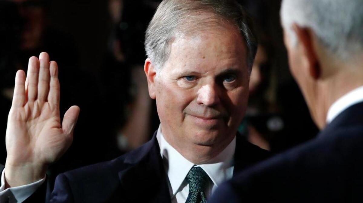 Sen. Doug Jones, D-Ala., took the oath of office during a mock swearing in ceremony in the Old Senate Chamber on Jan. 3. He won a special election in a Republican-dominated state against retired judge Roy Moore, who faced sexual harassment allegations.