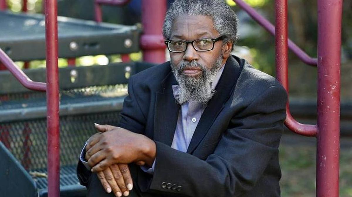 Victor Johnson sat on a playground near his apartment on Cambridge Drive in Lexington. The Johnson family was served an eviction notice in late December. They obtained housing through an emergency family shelter program and are trying to repair their credit.