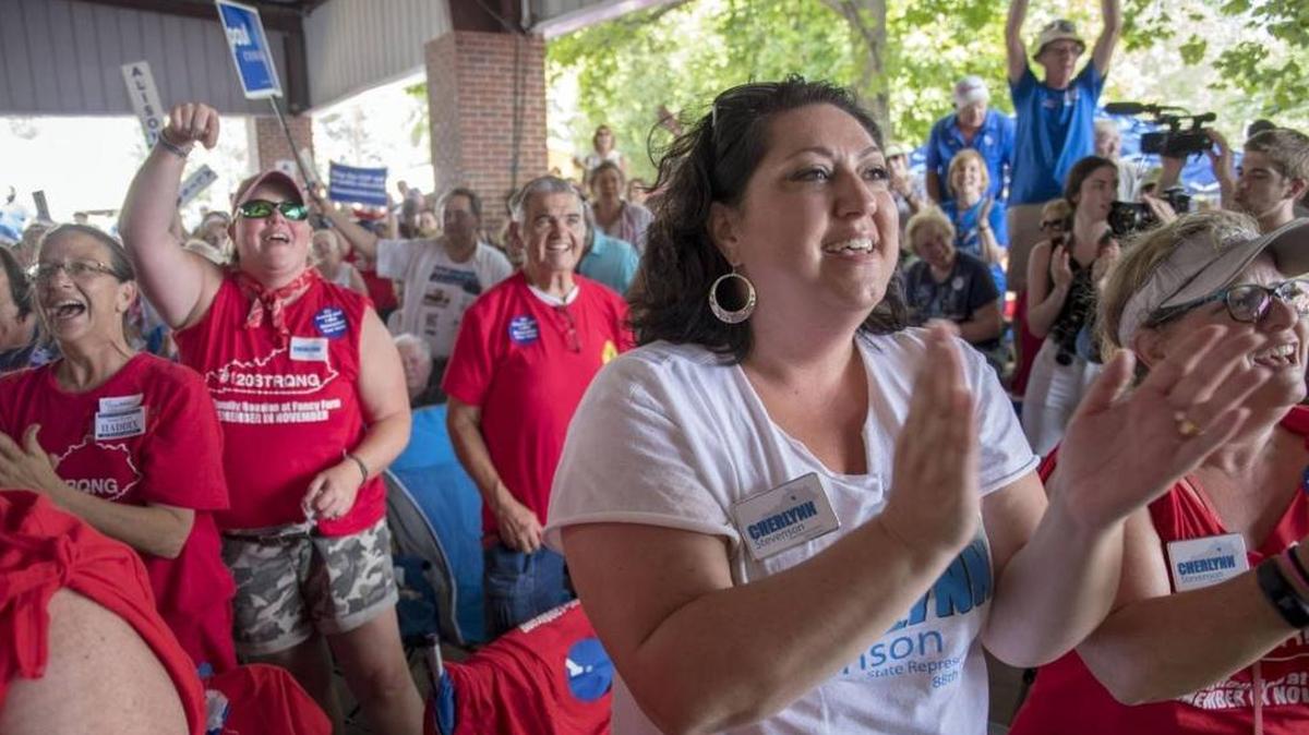 Kentucky school teachers rallied as Attorney General Andy Beasher spoke during the Fancy Farm Picnic on Aug. 4.
