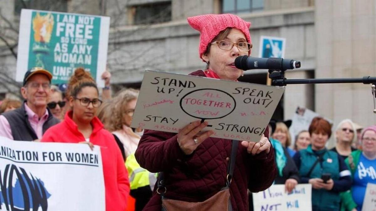 Kentucky poet laureate George Ella Lyon, wearing the trademark pussy hat, read a poem she wrote for the 2017 Women’s March rally in Robert F. Stephens Courthouse Plaza.