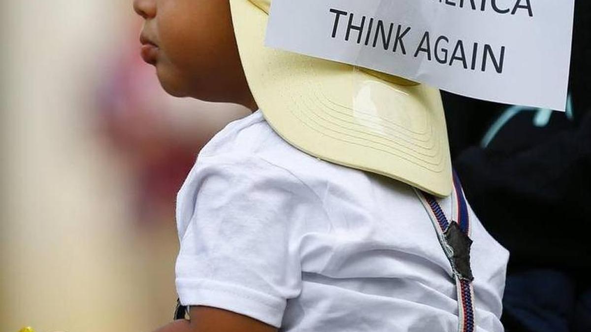A sign at a Lexington protest against plans to end a program that allows young immigrants to work and go to school.