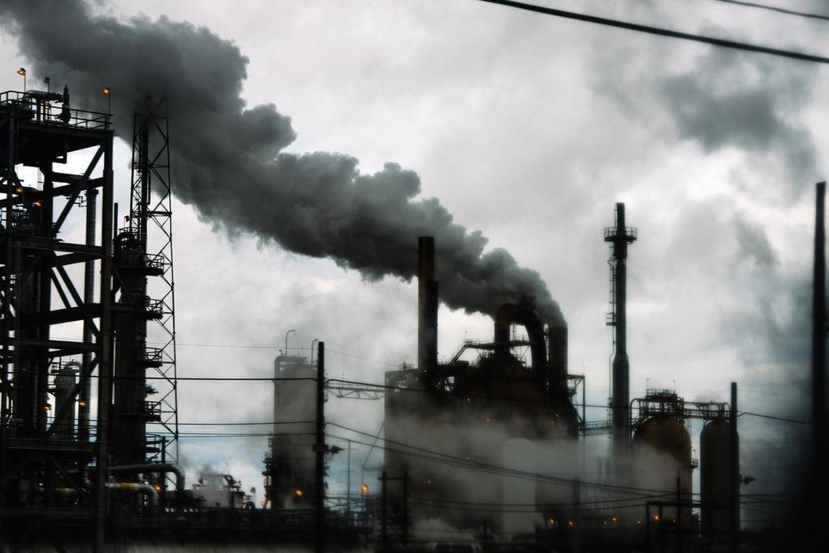 FILE -- An oil refinery in Port Arthur, Tex., Nov. 4, 2018. Without major action to rein in global warming, the American economy could lose 10 percent of gross domestic product by 2100, according to a report from 13 federal agencies. (Brandon Thibodeaux/The New York Times)