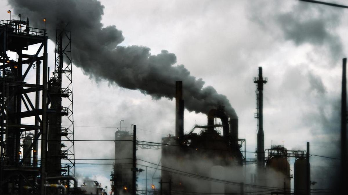 FILE -- An oil refinery in Port Arthur, Tex., Nov. 4, 2018. Without major action to rein in global warming, the American economy could lose 10 percent of gross domestic product by 2100, according to a report from 13 federal agencies. (Brandon Thibodeaux/The New York Times)