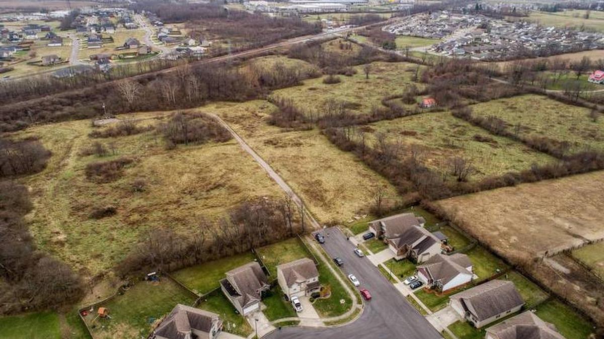 Aerial view of proposed 40-acre development on Spurr Road, seen here between the railroad tracks, top left, and Spurr Road, top right.