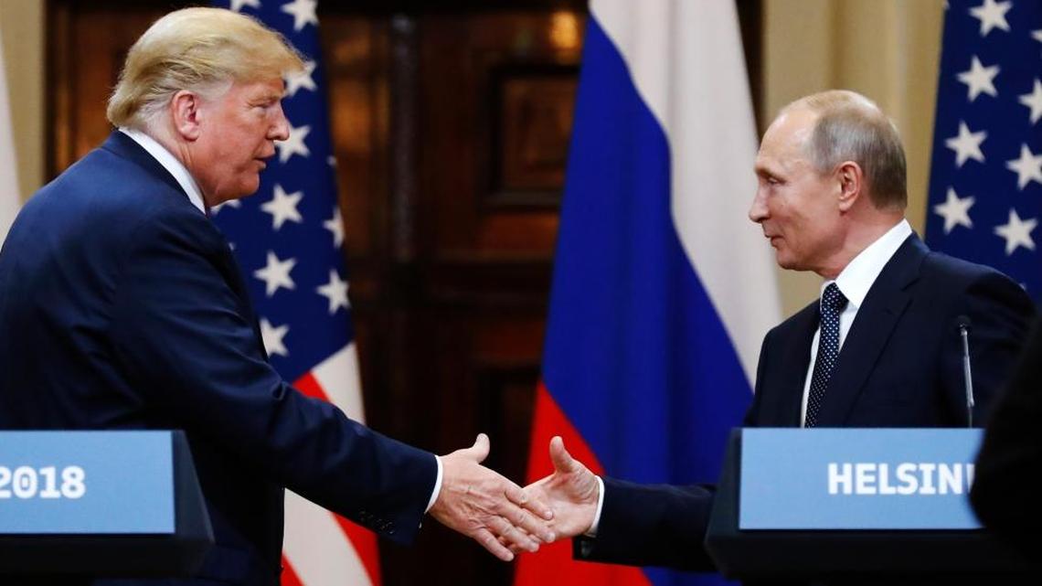 U.S. President Donald Trump shakes hand with Russian President Vladimir Putin at the end of the press conference after their meeting at the Presidential Palace in Helsinki, Finland, Monday, July 16, 2018. (AP Photo/Alexander Zemlianichenko)