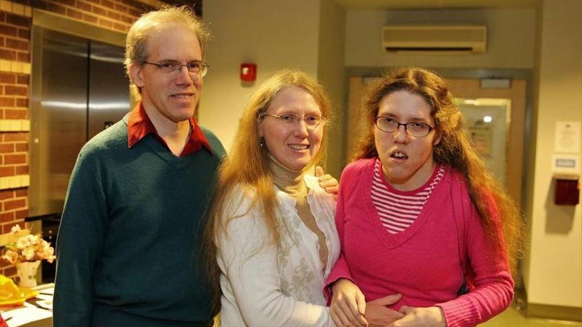 Wendy Wheeler-Mullins, with husband, Wade, and daughter, Amelia, at the Dec. 16 fundraiser, Shedding the Mask on Disabilities, sponsored by Arc of Central Kentucky.