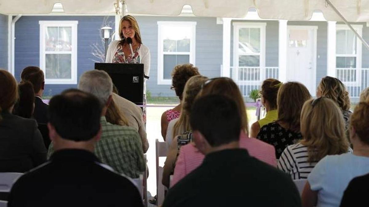 GreenHouse17 Executive Director Darlene Thomas spoke during a June ribbon-cutting for a dozen affordable apartments for survivors of domestic violence in Lexington.