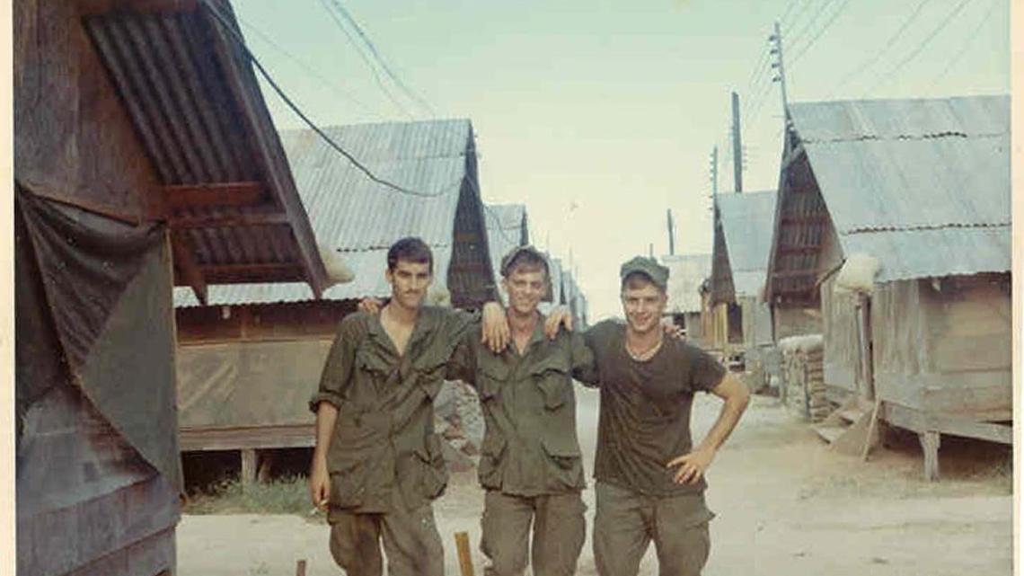 Robert Topmiller, center, in Vietnam in 1968. Topmiller, a former Eastern Kentucky University history professor and advocate for veterans, committed suicide in 2008. On the left is Michael Archer, an author of military nonfiction, who will speak 10 a.m. Saturday during an EKU ceremony honoring those who lost their lives due to their service, even when the actual service was over.