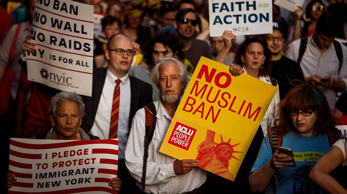 People in New York protested Tuesday the U.S. Supreme Court’s decision to uphold President Donald Trump’s ban on travel from several mostly Muslim nations.