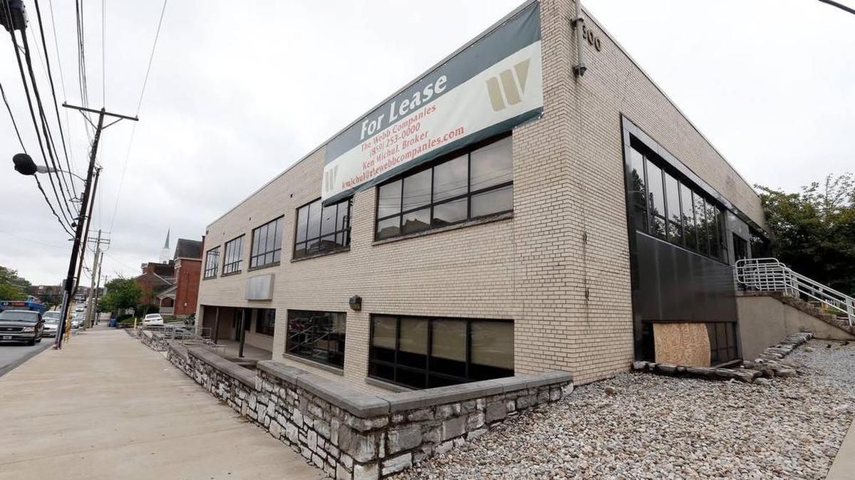 The Blue Grass Trust for Historic Preservation is suing to prevent demolition of the former employment office at 120 W. High and South Upper streets. The Webb Companies want to tear down the two-story building and build a four-story condo building.