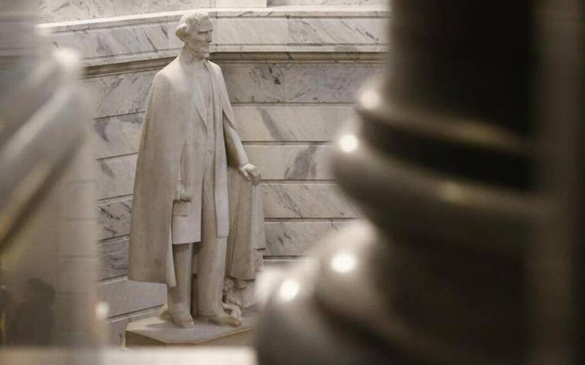 Statue of Jefferson Davis, president of the Confederacy, still stands in the Kentucky Capitol. Lexington recently removed two Confederate statues from downtown to a cemetery.
