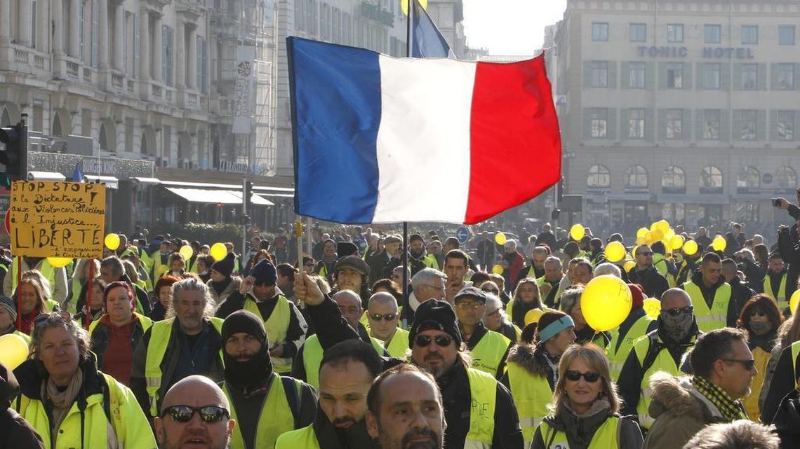Demonstrators wearing their yellow vests demonstrate in Marseille, southern France on Dec. 29.
