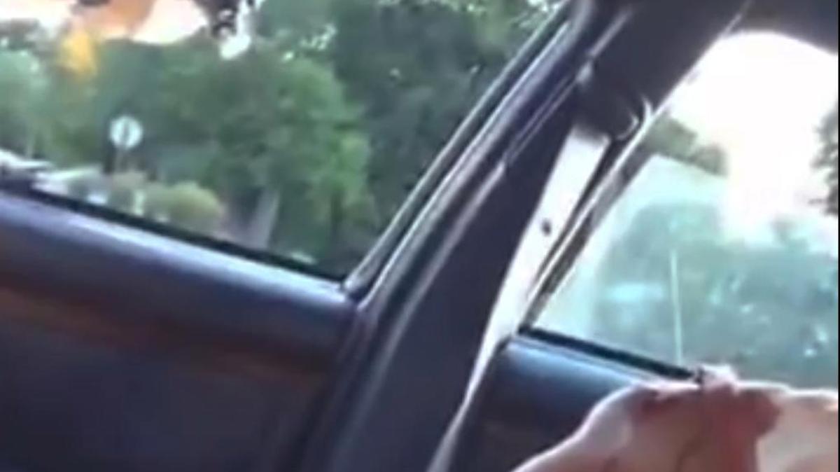 This still image taken from video by Diamond Reynolds shows a police officer pointing a gun at her boyfriend, Philando Castile, during a traffic stop on July 6, in Falcon Heights, Minn. Castile died after the officer shot him several times.