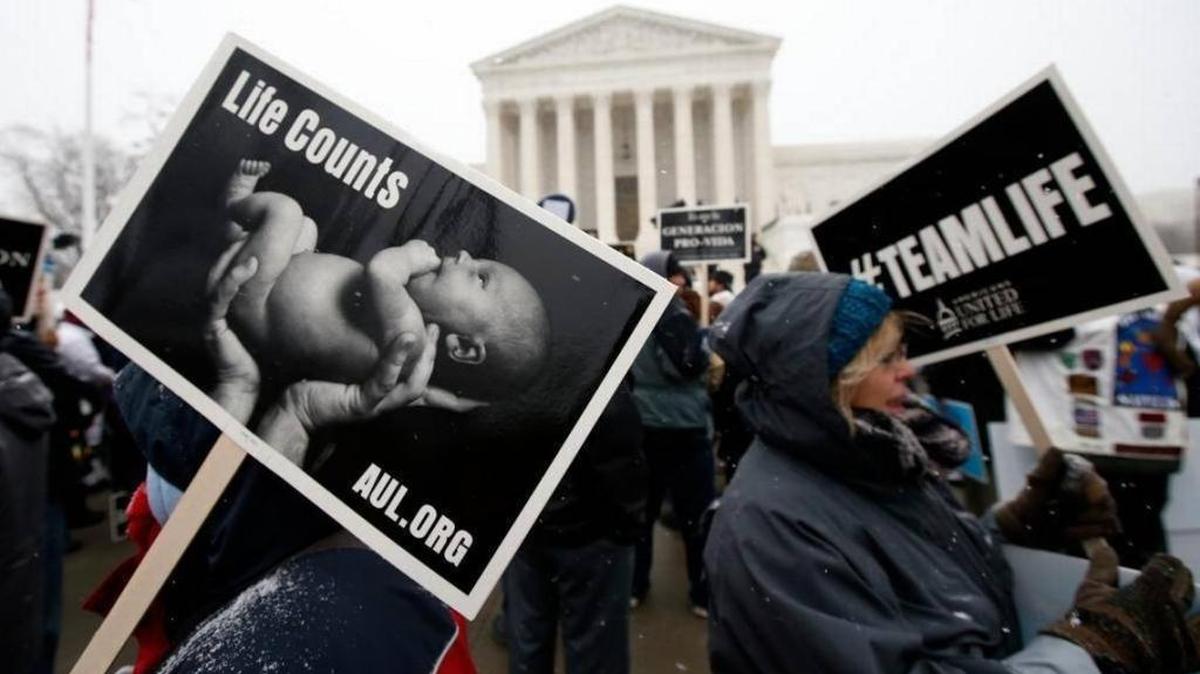 At the 2016 March for Life, attendees carried signs in front of the U.S. Supreme Court to protest the 1973 Roe v. Wade decision legalizing abortion.