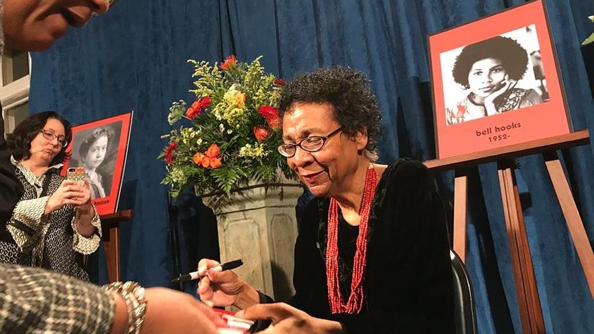 Author bell hooks signed autographs in 2018 as part of her induction into the Kentucky Writers’ Hall of Fame at the Carnegie Center for Literacy and Learning in Lexington.