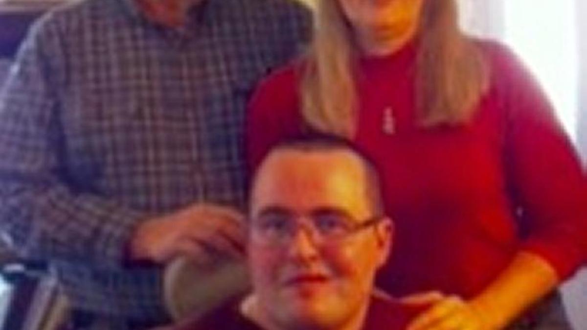 Mark and Elizabeth White of Pikeville are concerned about cutbacks in a state Medicaid program that provides various therapies for their son, Matthew, who has an acquired brain injury.