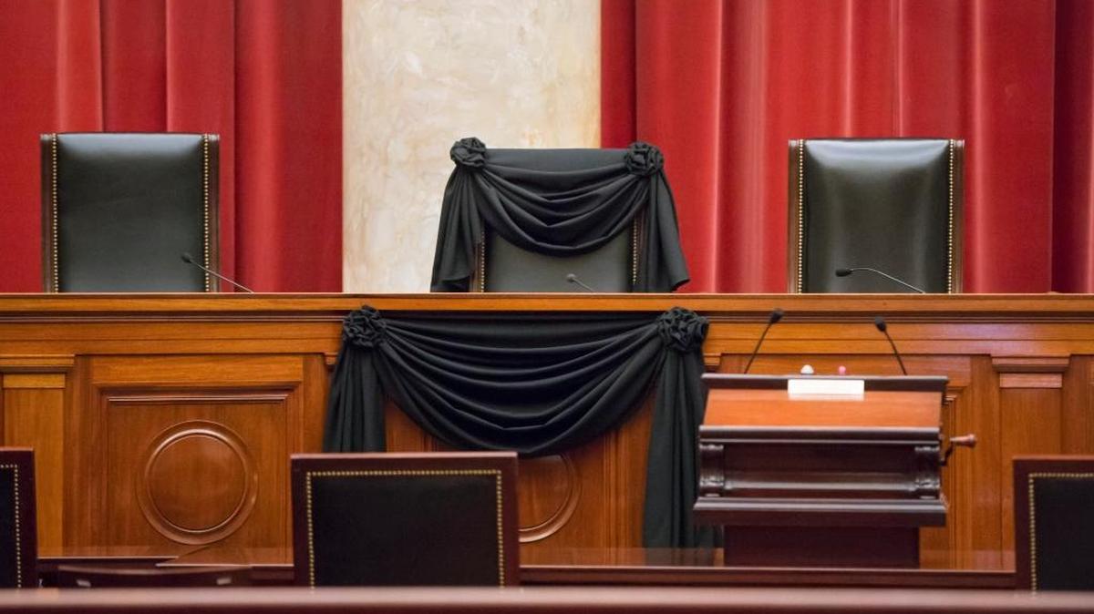 Supreme Court Justice Antonin Scalia’s courtroom chair has been draped in black to mark his death, part of a tradition that dates to the 19th century. Scalia, who died Saturday at age 79, joined the court in 1986 and was its longest-serving justice.