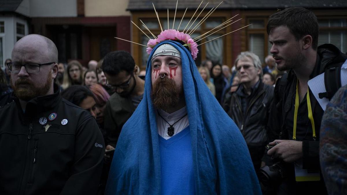 A man dressed as the Virgin Mary takes part in a protest against child abuse in the Roman Catholic Church, during Pope Francis’ visit to Ireland on Sunday.