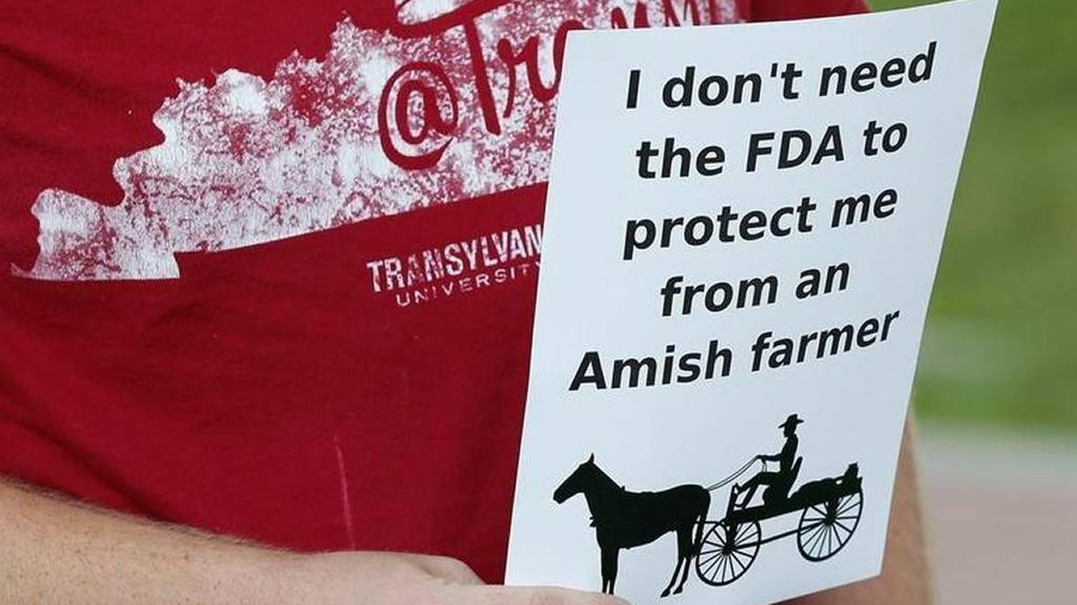 A protester held a sign in support of Samuel A. Girod at the U.S. courthouse in Lexington last year. Girod of Bath County was convicted of obstruction of justice and selling herbal health products not adequately labeled, as required by federal law. The U.S. Sixth District Court Appeals recently refused to overturn his six-year sentence.
