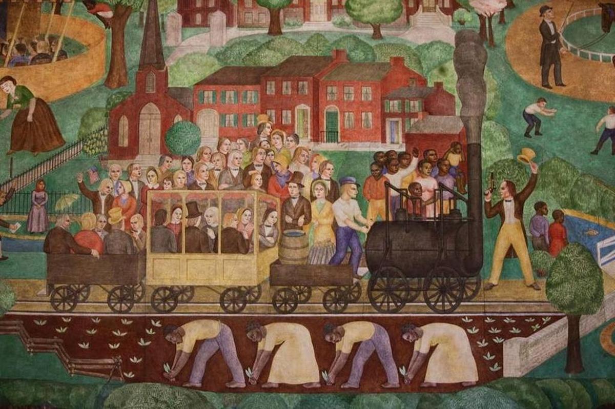 The controversial mural in Memorial Hall shows scenes of state history, including black workers in a tobacco field, black musicians playing for white dancers, and a Native American with a tomahawk.
