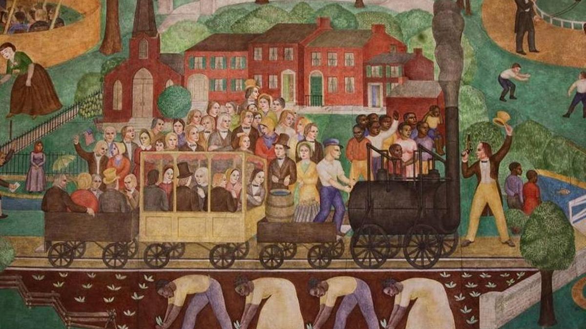 The controversial mural in Memorial Hall shows scenes of state history, including black workers in a tobacco field, black musicians playing for white dancers, and a Native American with a tomahawk.