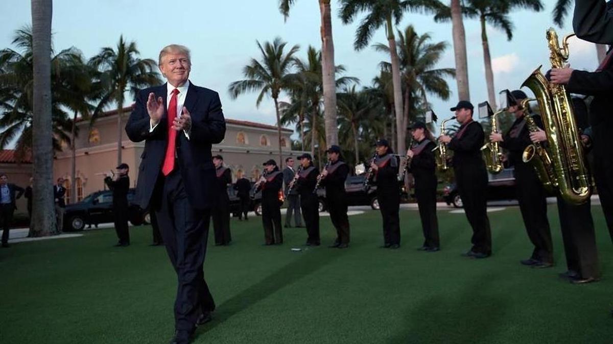 A high school band greeted President Donald Trump at the Trump International Golf Club in West Palm Beach on a recent Sunday.