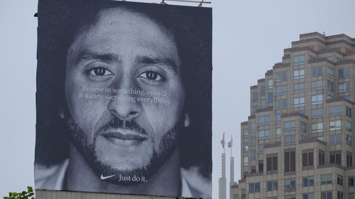 In San Francisco’s Union Square stands a Nike billboard showing Colin Kaepernick, who started a wave of protests among NFL players of police brutality, racial inequality and other social issues.