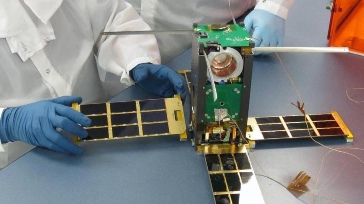 Morehead State University researchers assembled solar panels on a CubeSat satellite. The university’s Space Science Center has become a leader in designing and building small, high-tech spacecraft.