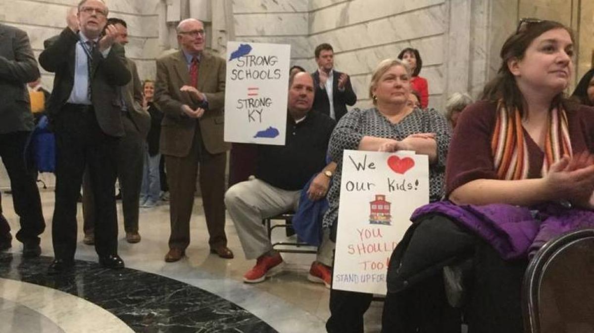 Teachers rallied Jan. 2 at the state Capitol to urge lawmakers not to further cut school funding in the next state budget.