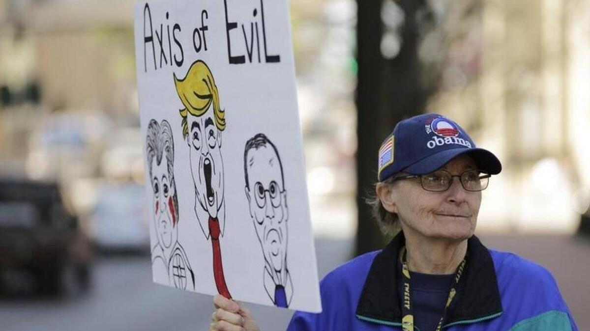 Jody Lambert of Georgetown during an April 12 Indivisible Bluegrass protest at Triangle Park