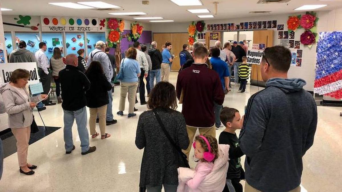 Waiting in line on Election Day at Veterans Park Elementary School in Lexington, where Charwood, Laurelwood and Magnolia Gardens precincts vote.