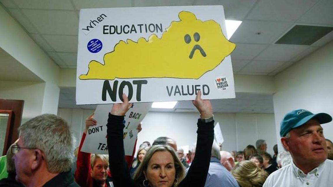 Retirees and teachers protest prior to a meeting of the Senate State and Local Government Committee to consider Senate Bill 1 on pension reform at the Kentucky State Capitol Annex in Frankfort on Feb. 28.