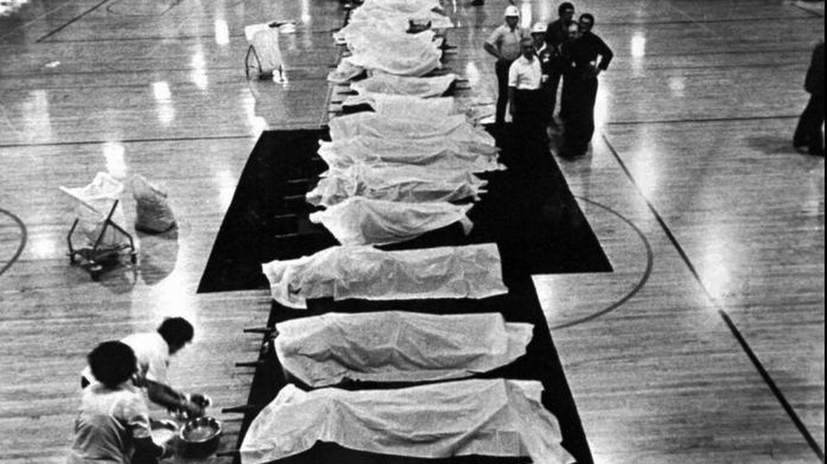 Medical personnel and volunteers worked May 29, 1977 in the Ft. Thomas Armory, where the bodies of the victims of the Beverly Hills Supper Club fire were lined up for identification. The armory served as a makeshift morgue for the 165 fire victims.