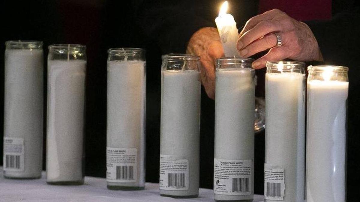 Candles were lit during a Lexington vigil to honor the victims who were killed in an attack at a synagogue in Pittsburgh.