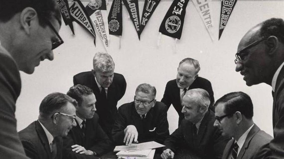 The first meeting of the editorial board of the University Press of Kentucky in 1969, after it became a statewide consortium. From left to right: William M. Jones, Berea College; Victor B. Howard, Morehead State University; Lowell H. Harrison, Western Kentucky University; Richard M. Kain, University of Louisville; Albert Kirwan, University of Kentucky;Frederic D. Ogden, Eastern Kentucky University;Charles T. Hazelrigg, Centre College; Vance Ramage, Murray State University; Henry E. Cheaney, Kentucky State University.