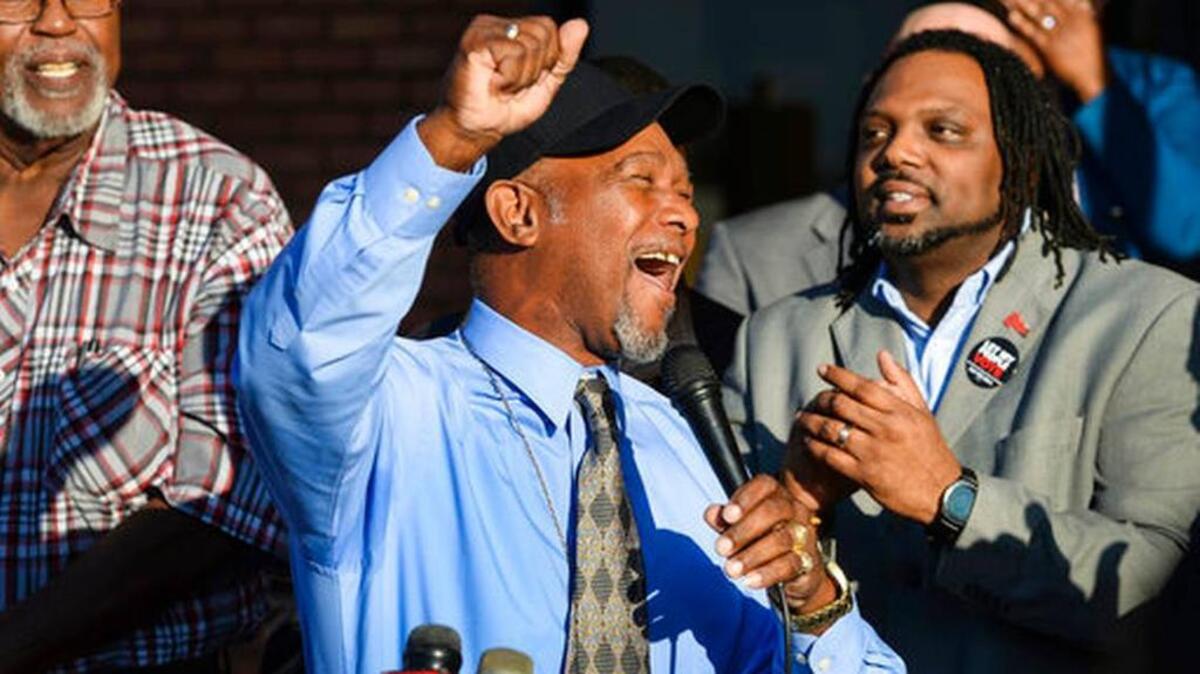 Pastor Wesley Tunstall, a convicted felon, praised God and addressed the media, after registering to vote Jan. 8, the first day that Amendment 4, which restores the right to vote for most Florida felons, took effect.
