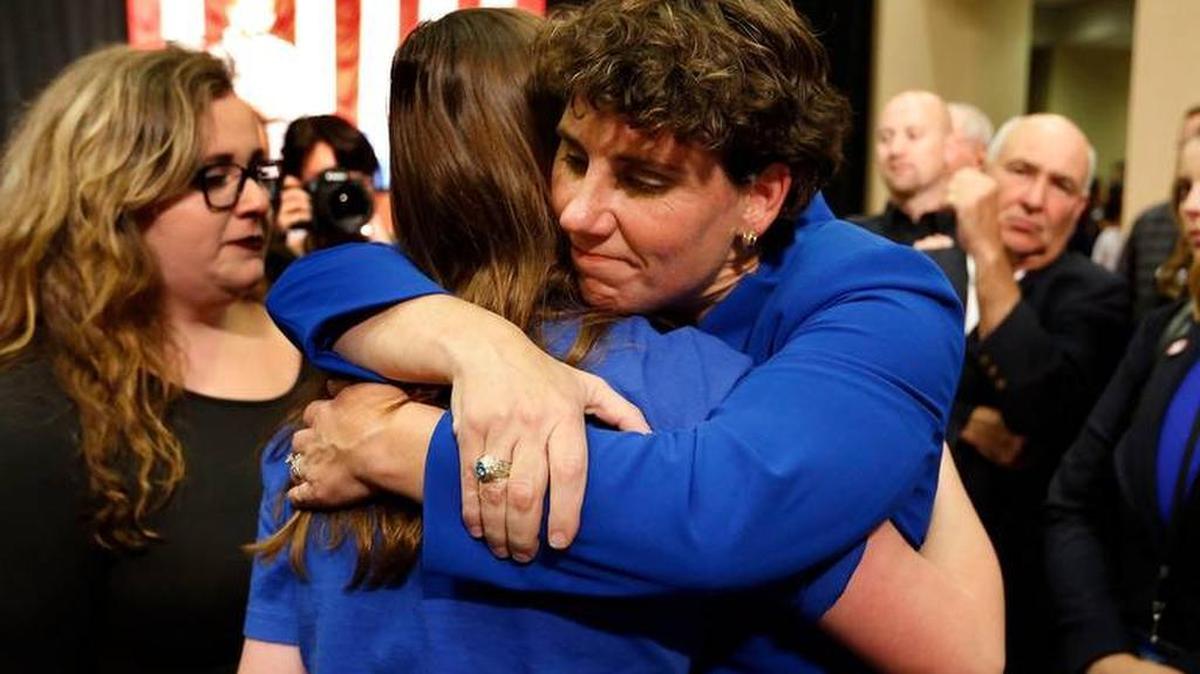 Supporters lined up for hugs after retired U.S. Marine Lt. Colonel Amy McGrath conceded to Congressman Andy Barr on election night.