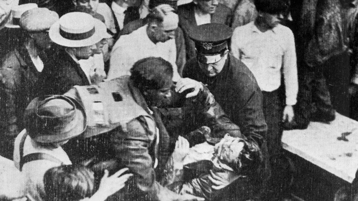 Garrett Morgan, center, rescued some victims of a 1916 tunnel explosion in Cleveland, using his gas mask invention.