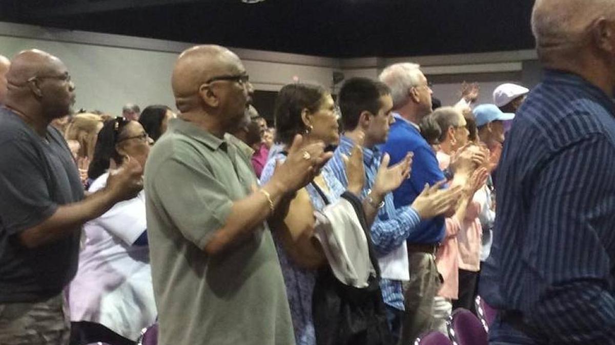 BUILD members applaud during this year’s Nehemiah Action Assembly April 25.