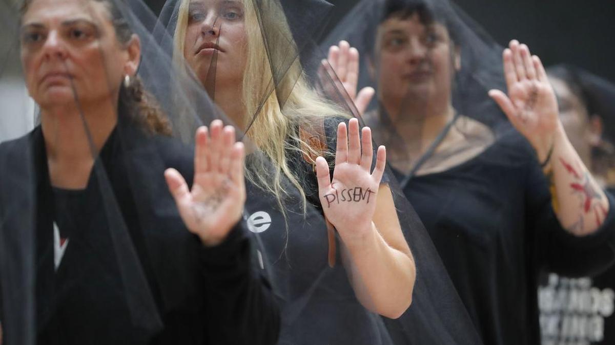 Protesters in black veils attended a Sept. 7 confirmation hearing for Supreme Court nominee Brett Kavanaugh.