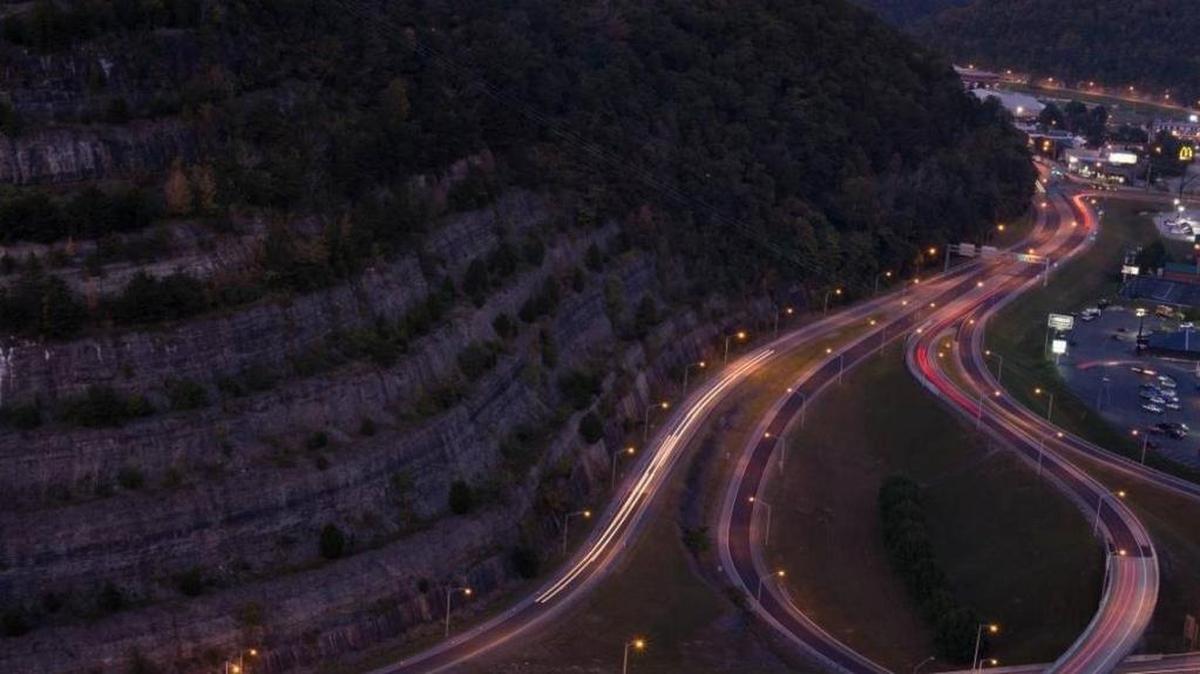 A hill towers above a busy highway just outside Pikeville in September.