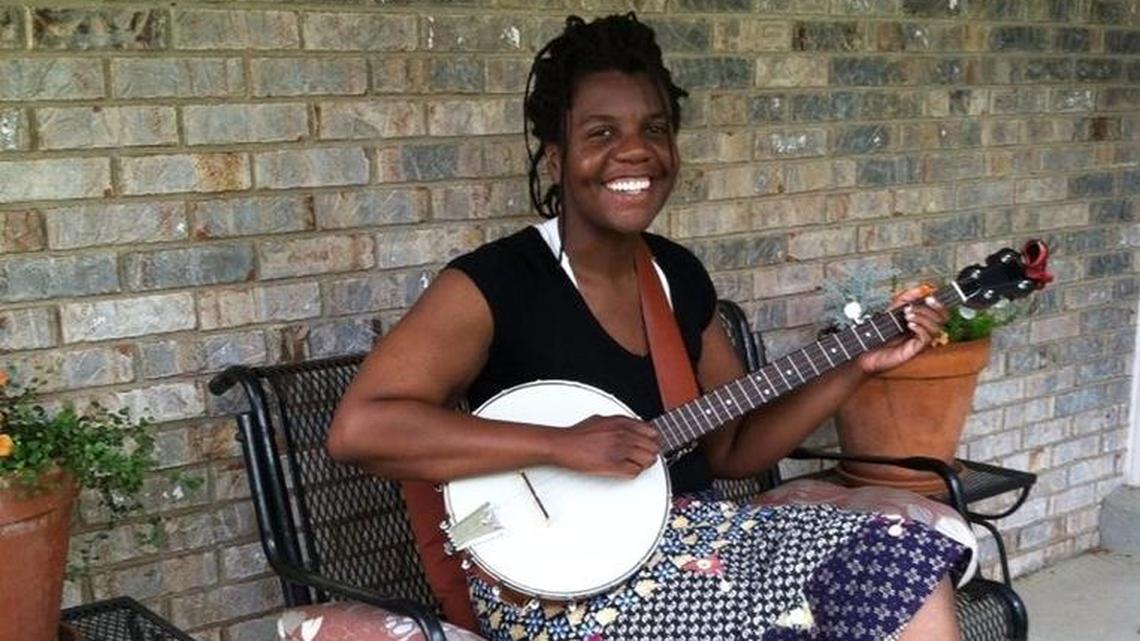 Jillean McCommons, a librarian who lives in Berea, posed with her banjo.