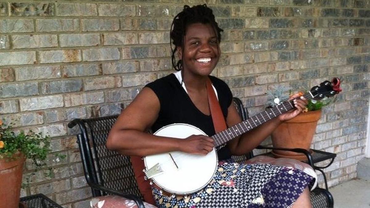 Jillean McCommons, a librarian who lives in Berea, posed with her banjo.